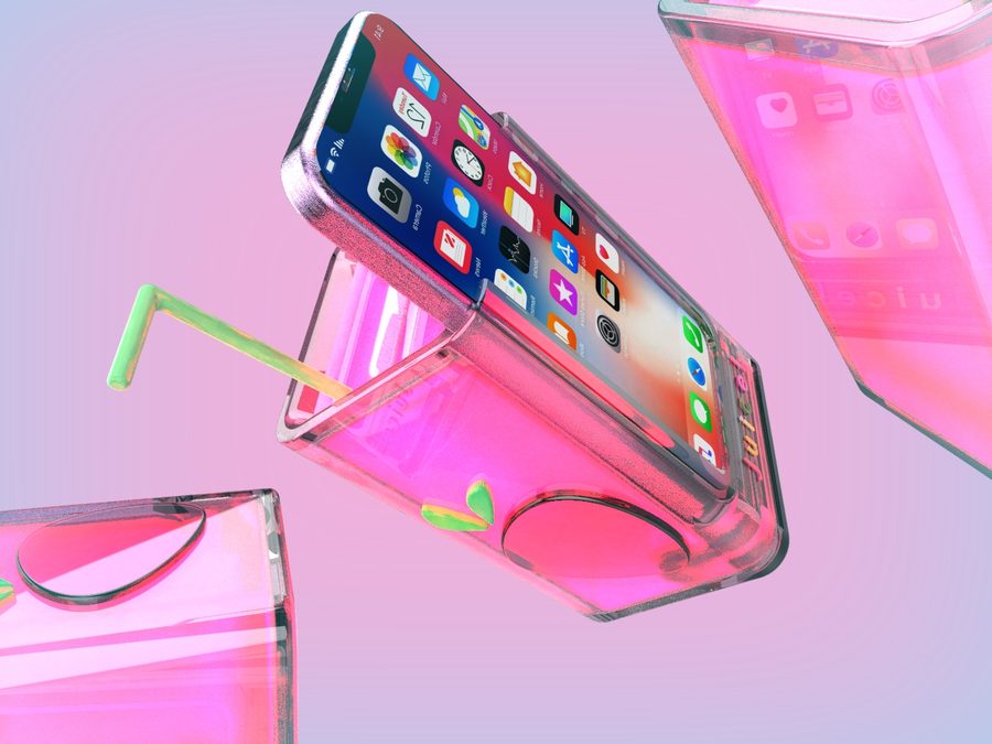 Translucent pink juice box phone holder and speaker with a green straw, holding an iPhone